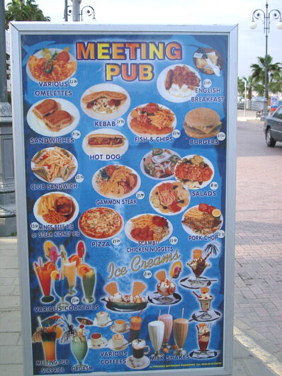 Sign with The Meeting Pub's menu