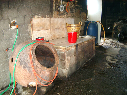 Making carob syrup in Cyprus