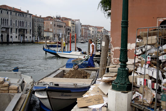 Worker with wheelbarrow in Venice